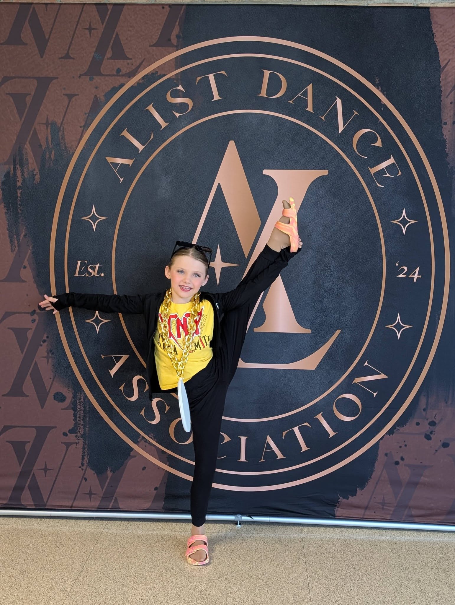 Allie posing at a dance competition